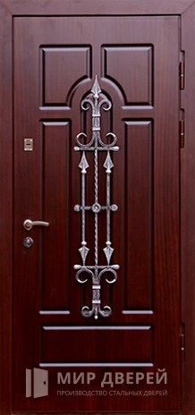 Фото «Входная дверь с ковкой в дом №18»